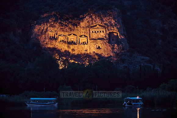 night shot of illuminated Lycian rock tombs in a rock face of Dalyan