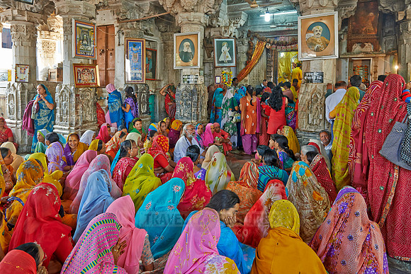 colorful hindu women during ceremony