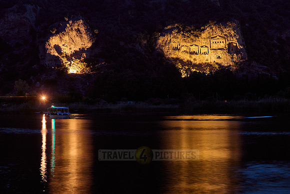 night shot of illuminated Lycian rock tombs in a rock face of Dalyan