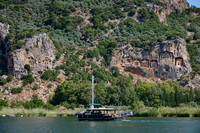Tourist ship in front of Lycian rock tombs