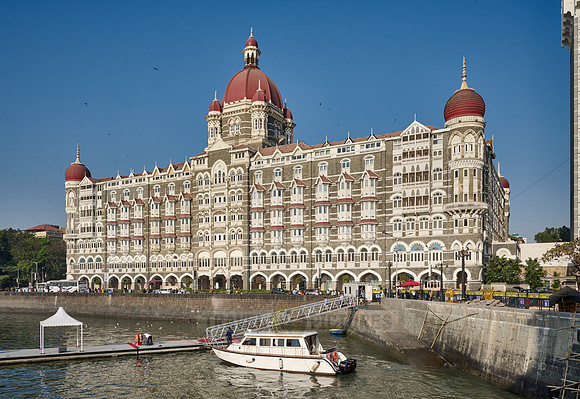 local ships in front of the famous Taj Mahal Palace hotel