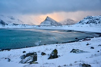winter landscape with sea and mountains at Sandbotnen, Lofoten