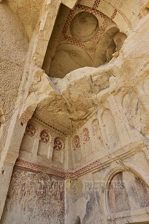 collapsed exterior of underground church in goreme open air museum