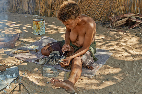 Bushmen preparing handicraft