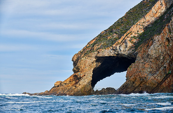 cliffs and cave at coastline
