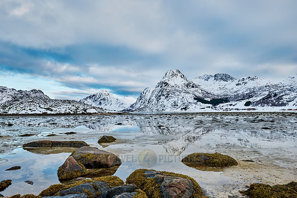 mountains and winter landscape at Flakstadpollen, Flakstad,