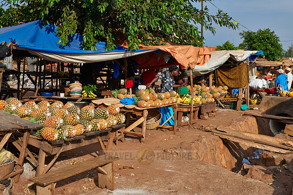 market stalls with pineapple and bananas