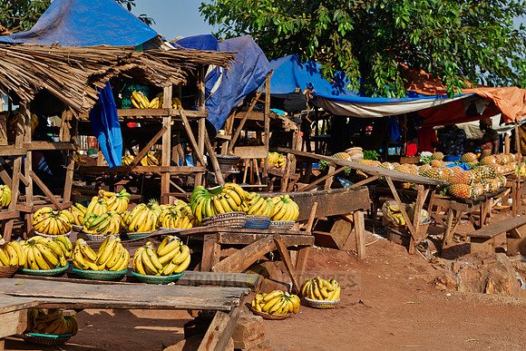 market stalls with pineapple and bananas