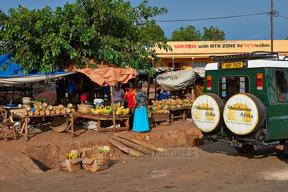 market stalls with pineapple and bananas