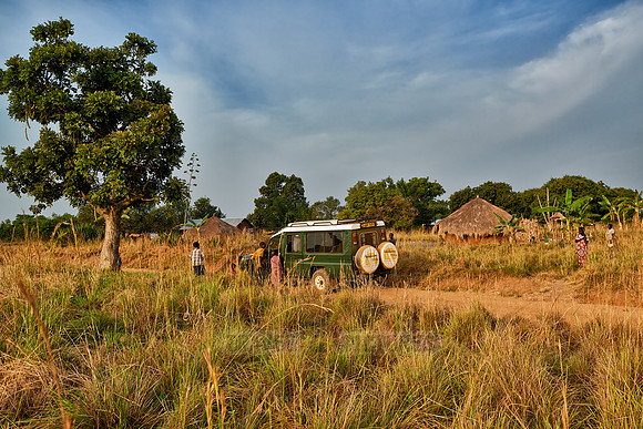 locals around 4x4 in village