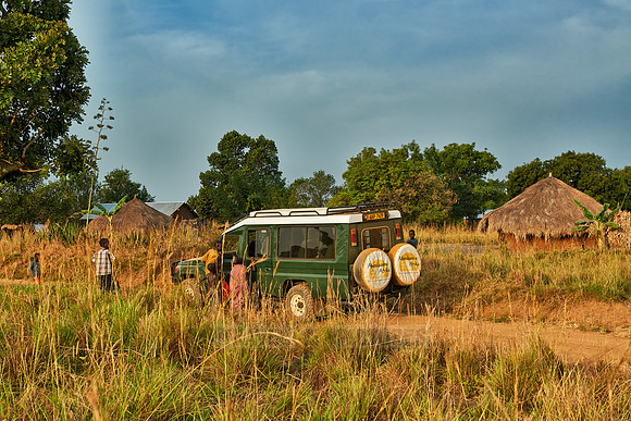 locals around 4x4 in village