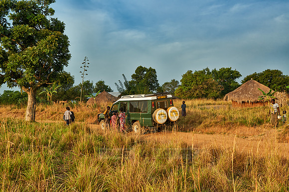 locals around 4x4 in village