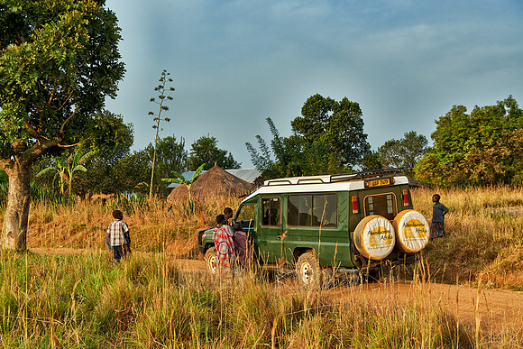 locals around 4x4 in village