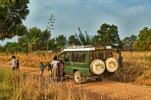 locals around 4x4 in village
