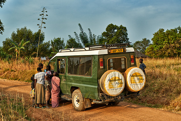 locals around 4x4 in village