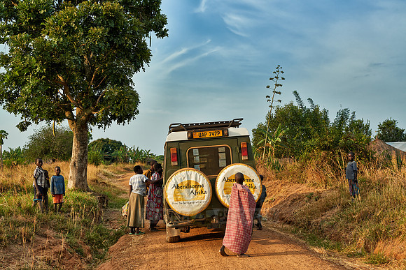 locals around 4x4 in village