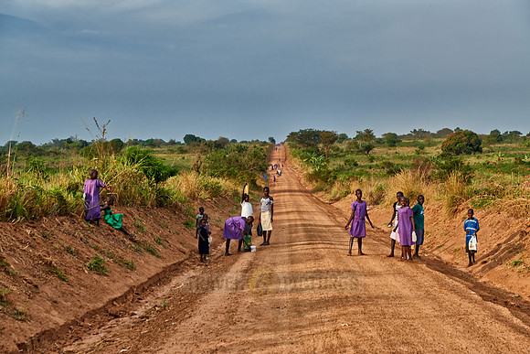 pedestrians on gravel road