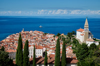 View from above onto Piran with the Mediterranean Sea behind