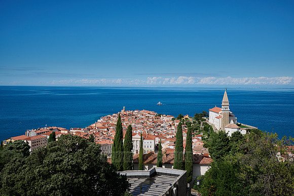 View from above onto Piran with the Mediterranean Sea behind