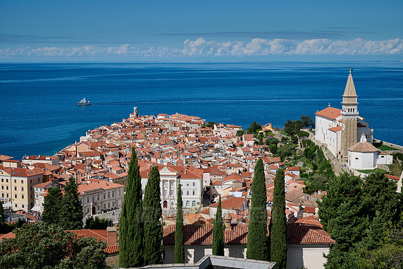 View from above onto Piran with the Mediterranean Sea behind