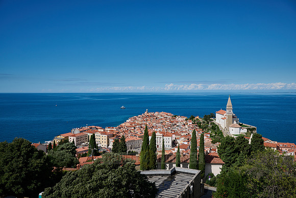 View from above onto Piran with the Mediterranean Sea behind