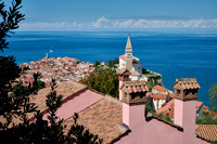 View from above onto Piran with the Mediterranean Sea behind