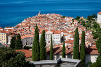 View from above onto Piran with the Mediterranean Sea behind