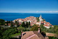 View from above onto Piran with the Mediterranean Sea behind