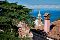 View from above onto Piran with the Mediterranean Sea behind