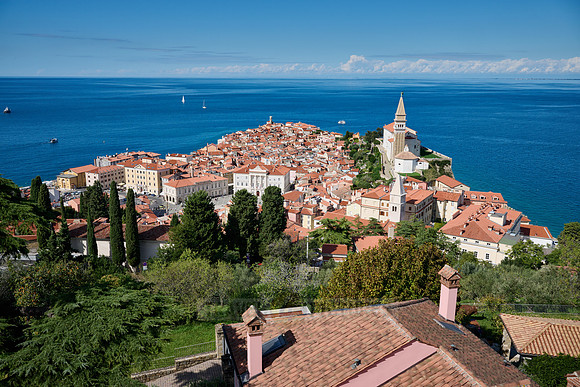 View from above onto Piran with the Mediterranean Sea behind