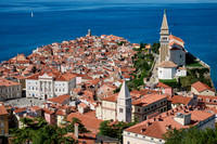 View from above onto Piran with the Mediterranean Sea behind
