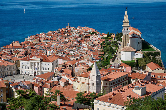 View from above onto Piran with the Mediterranean Sea behind