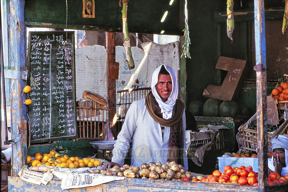 local Egyptian man at market stall