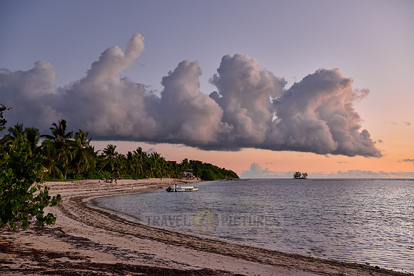 clouds and sunset at beach of Anse Reunion, La Digue