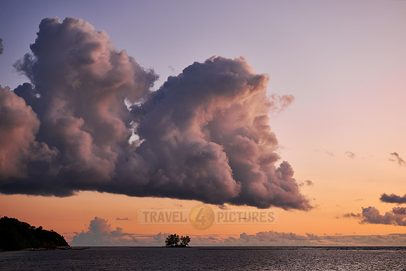 clouds and sunset at beach of Anse Reunion, La Digue