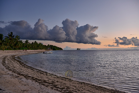 clouds and sunset at beach of Anse Reunion, La Digue