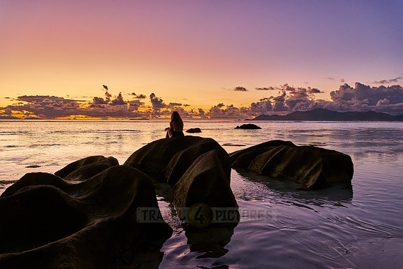 Sunset over the sea from the Anse Source D'Argent