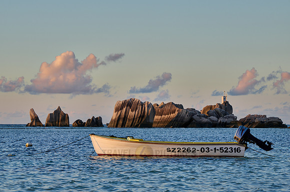 boat and rocks on La Digue