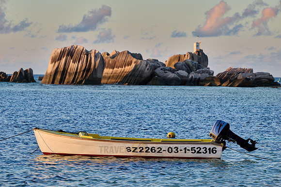 boat and rocks on La Digue
