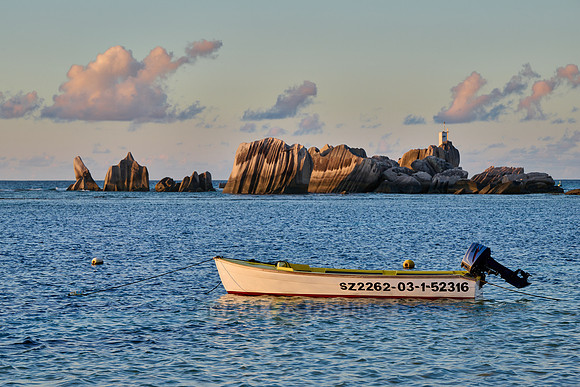 boat and rocks on La Digue