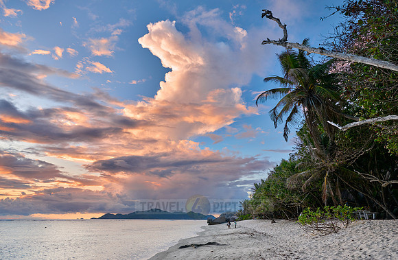 Cloud towers over Praslin in the evening seen from Anse Source D'Argent