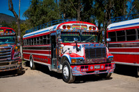 traditional colorful local busses in Antigua