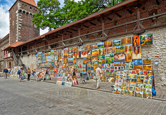 stalls with paintings at city wall