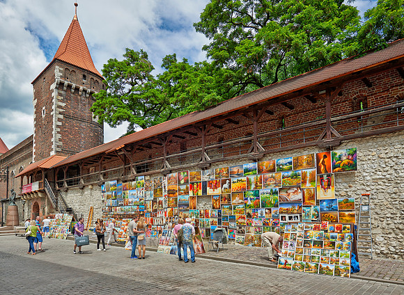 stalls with paintings at city wall