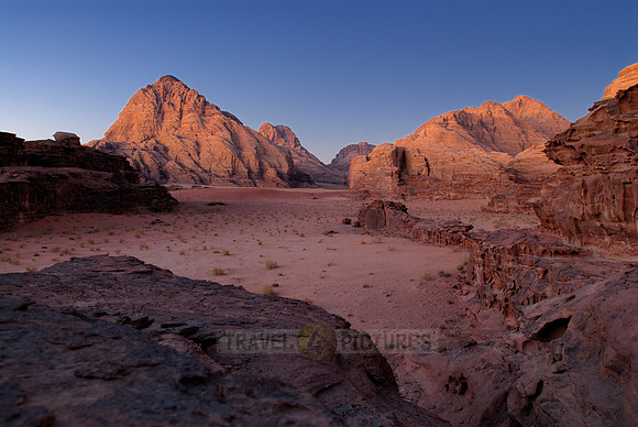 sunset in desert landscape of Wadi Rum