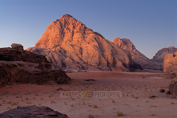 sunset in desert landscape of Wadi Rum