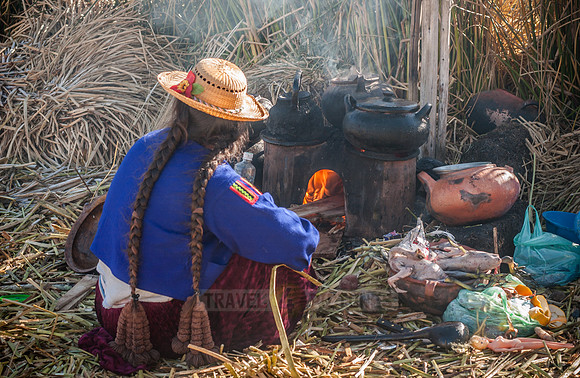 Indigena of local Uros tribe on floating reed islands
