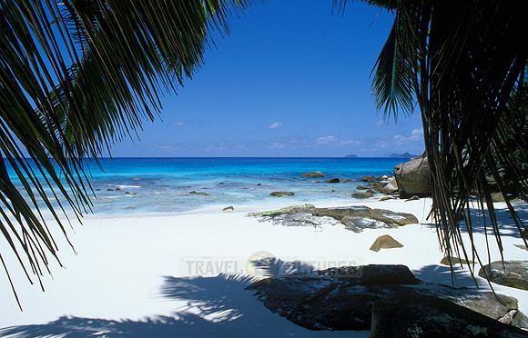 white beach, rocks and palms at "Petite Anse", Mahe Island