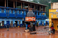 flooded road and coloured houses in Kabale