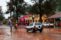 flooded road and coloured houses in Kabale